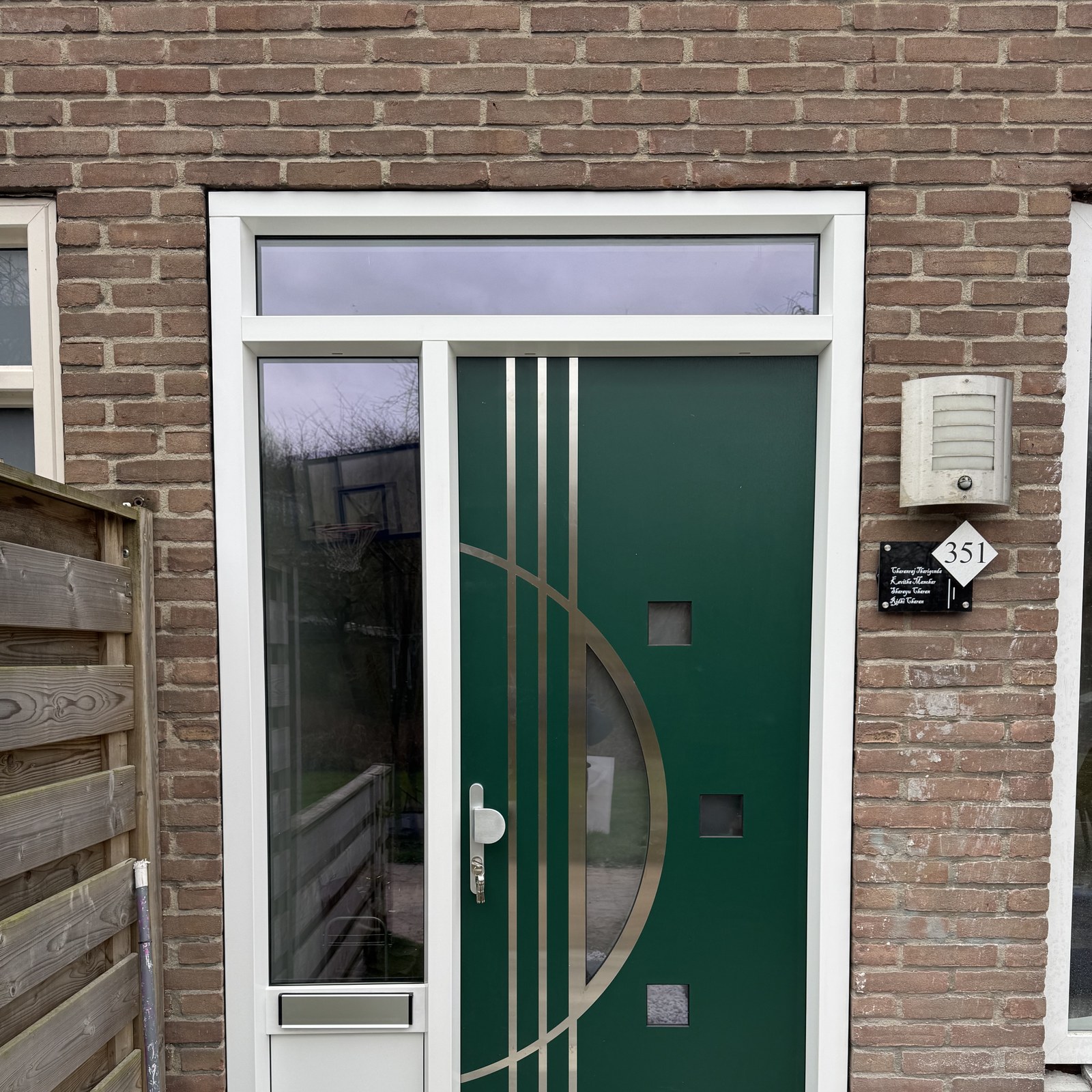 Designvoordeur groen met zijlicht